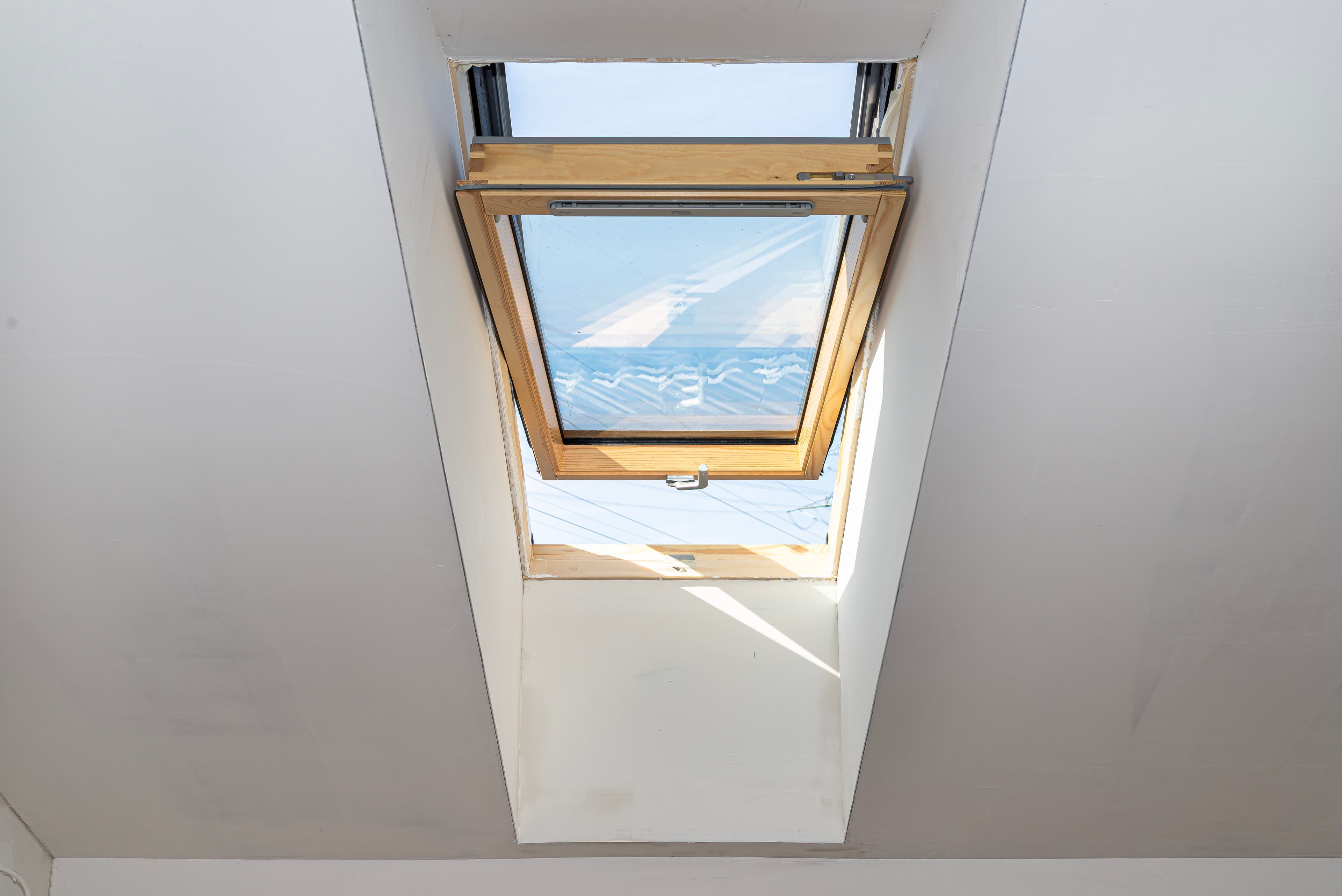 Pine trim and molding at a skylight